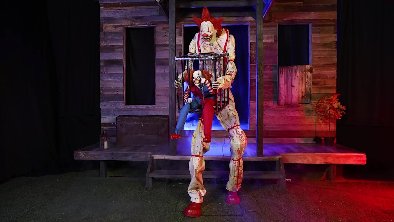 Bring the circus of horror home with this 7-foot Cagey the Clown animatronic. With sinister laughs and eerie motion, Cagey swings his captive clown in a cage, delivering unsettling thrills to anyone brave enough to approach.